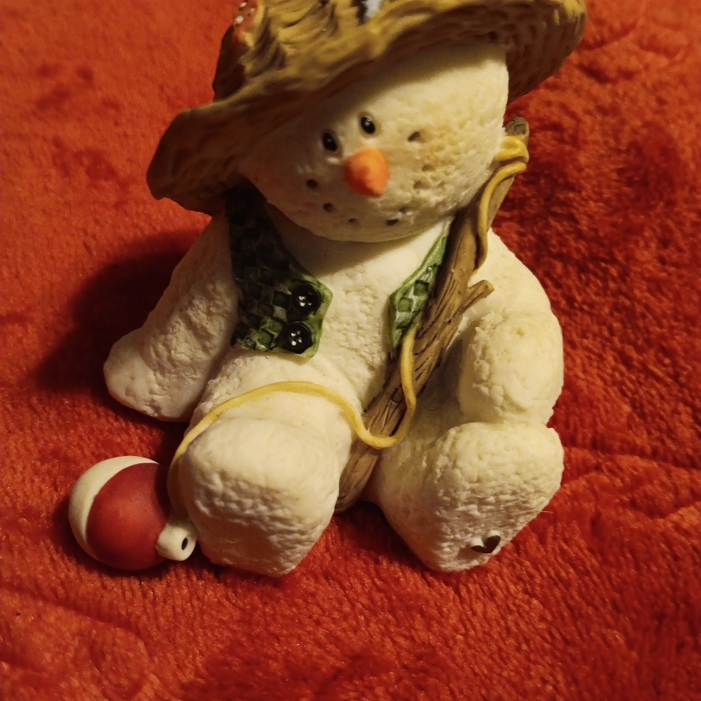 Adorable Snowman Figurine with Straw Hat